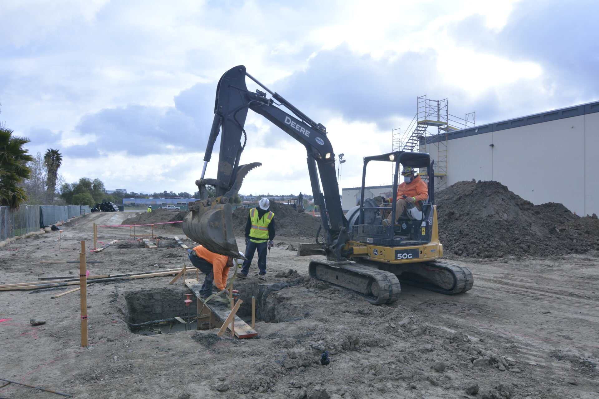 A construction equipment digging the dirt