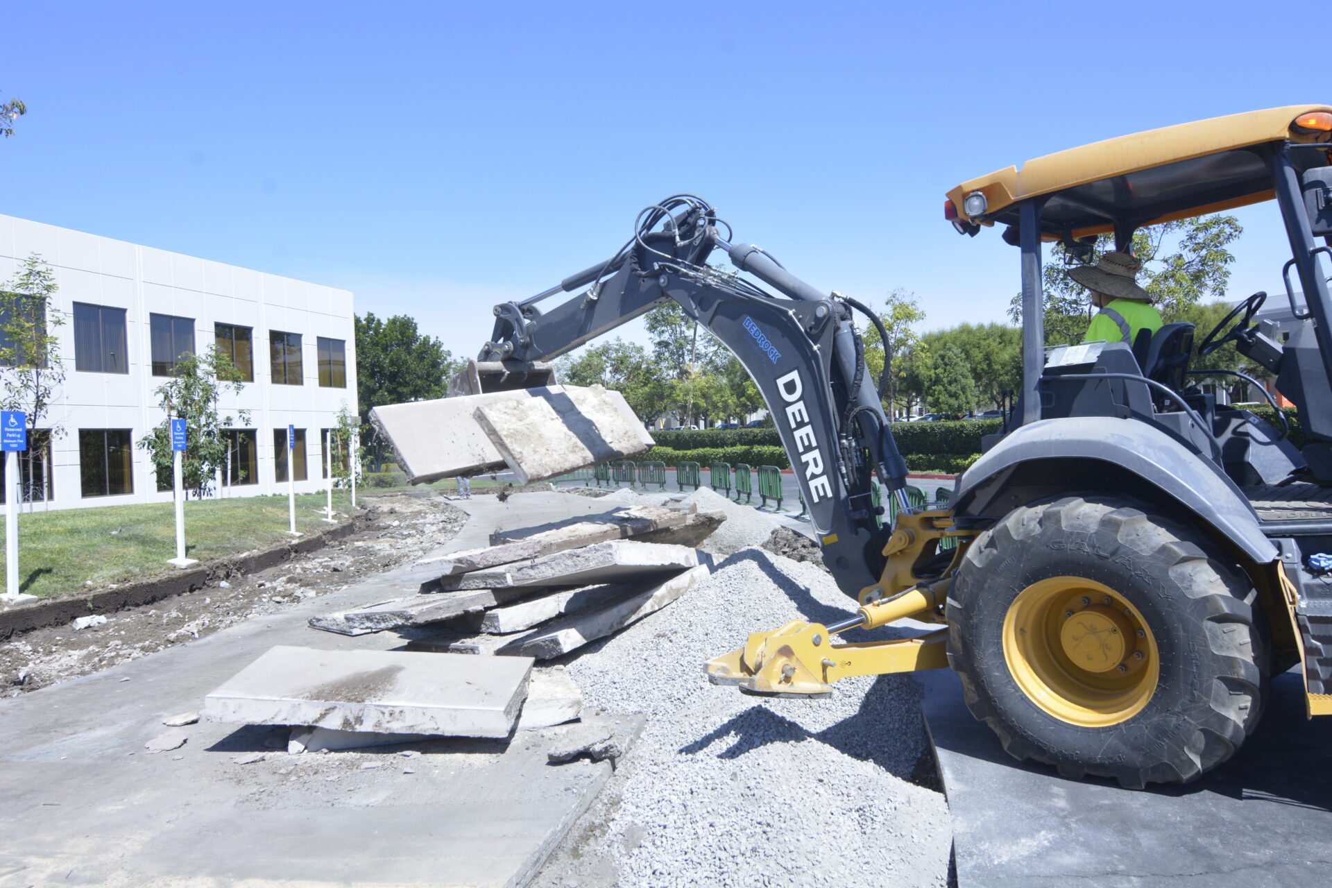 A crane equipment lifting up stone slabs
